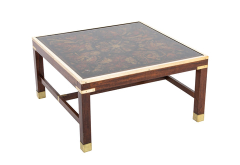 A Fornasetti Style Reverse Glass, Brass and Oak Coffee Table