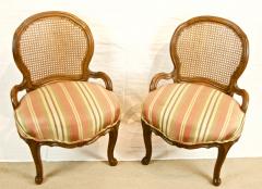 Pair of Caned Slipper Chairs