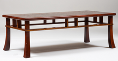 A Japanese style coffee table with rusticated top