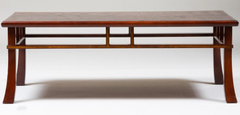 A Japanese style coffee table with rusticated top