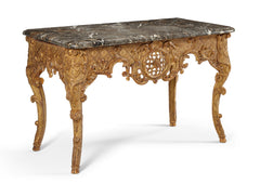 A Large Marble Top Regence Period Console In Gilded and Sculpted Wood