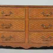 Pair of French Regence Style Leather Commodes
