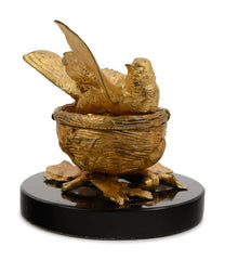 A Gilt Bronze Ink Stand Depicting a Bird in Nest