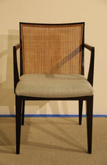 A Set of Eight Walnut and Caned Dining Chairs Designed by Edward Wormley.